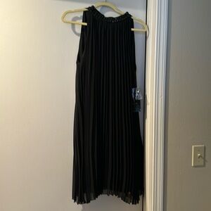 Pleated trapeze dress, beaded neckline